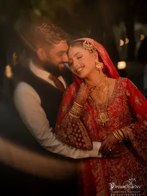 Straight out of the dreams I never stopped dreaming
10.01.26
@dreamweaverphotography.bd 

Makeover Bespoke Bride by Anmon @makeoversbyanmonn 
Outfit from @raymond_the_complete_man 
Lehenga from Pakistan 

[ wedding , asian wedding, red bride , explore , foryourpage , bengali bride , Pakistani bride] 
#redbride #weddingmakeup #desibride #weddingphotography #explorepage
